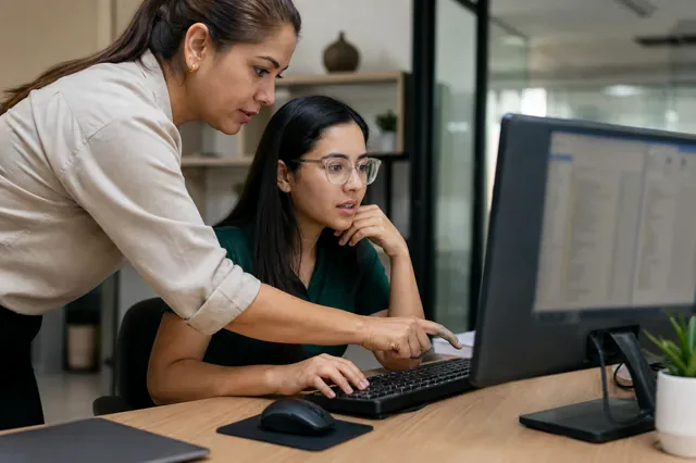 Employee learns a keyboard shortcut while organizing digital files.
